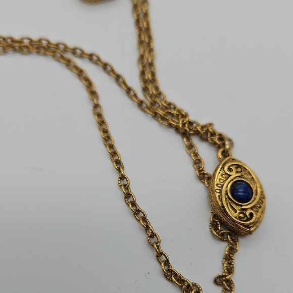 Elegant Gold Necklace with Navy Details - Picture 3 of 7